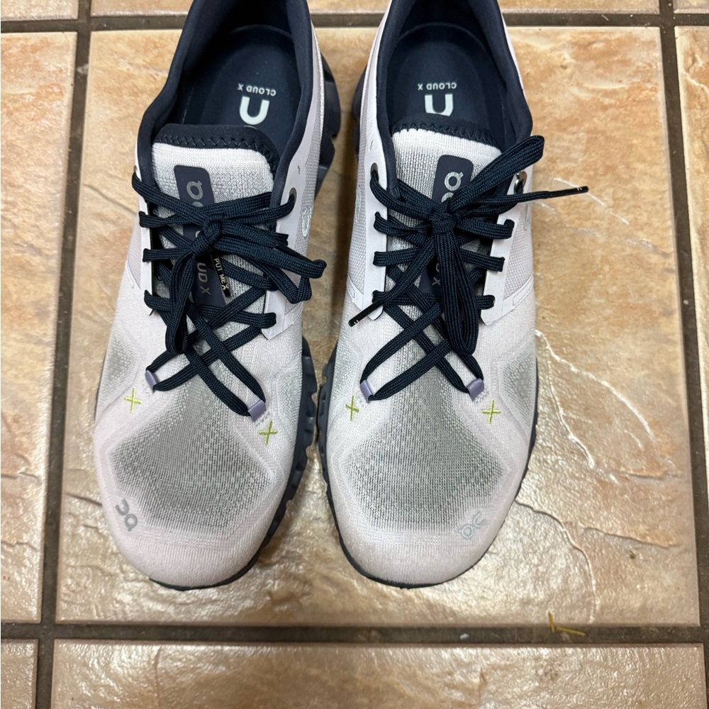On Running Cloud X Shoes in light purple and Black